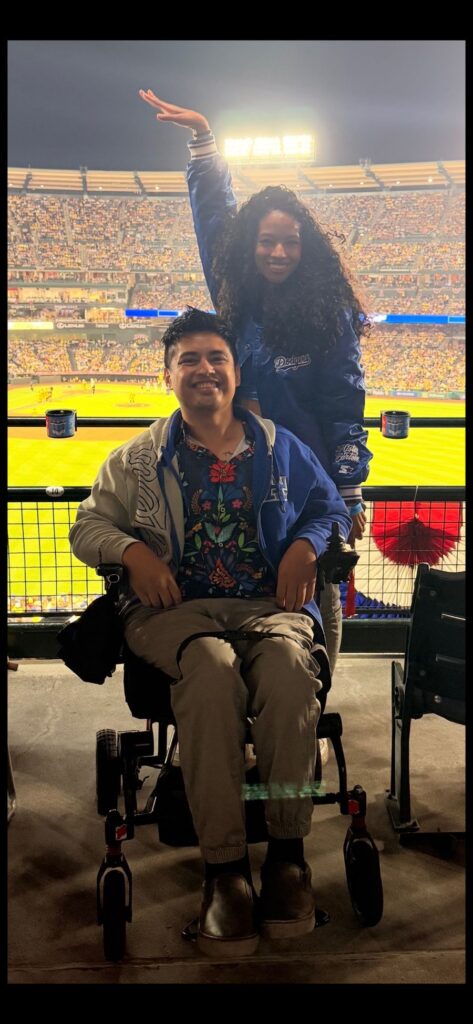 Mike smiling from accessible seating at a baseball game