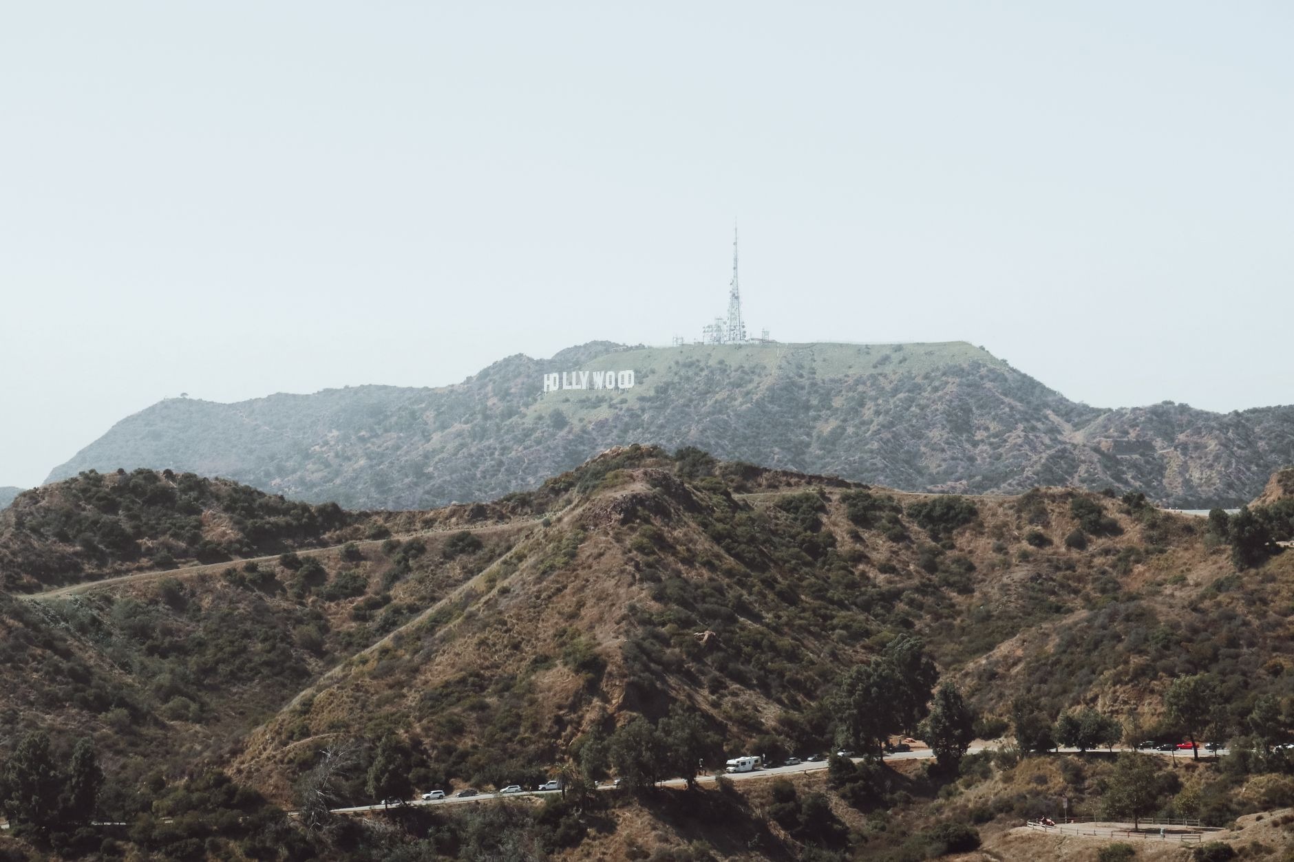 The Hollywood Sign on a dry chaparral hillside above Los Angeles