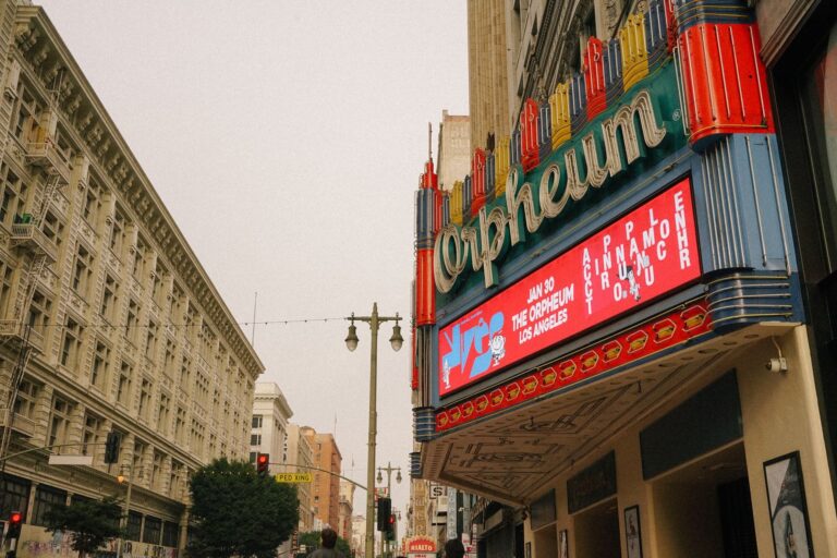 The neon marquee of the Orpheum Theatre on Broadway in downtown Los Angeles